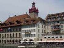 A building with a red roof

Description automatically generated