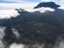 A mountain range with clouds

Description automatically generated